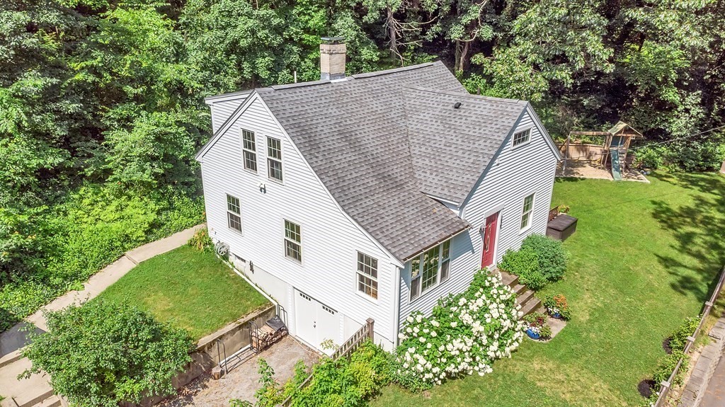 239 Sudbury Road Stow, MA 01775 - Photo 2 of 31 an aerial view of a house with a yard and potted plants