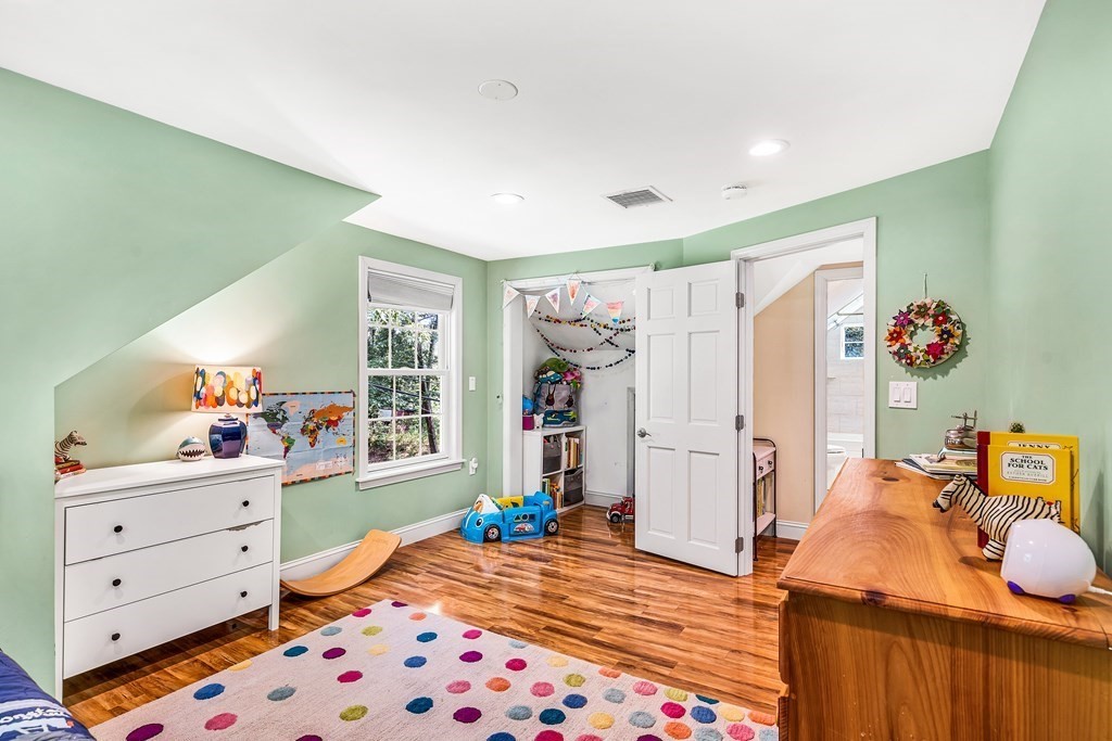 239 Sudbury Road Stow, MA 01775 - Photo 21 of 31 a bed room with a bed and a dresser