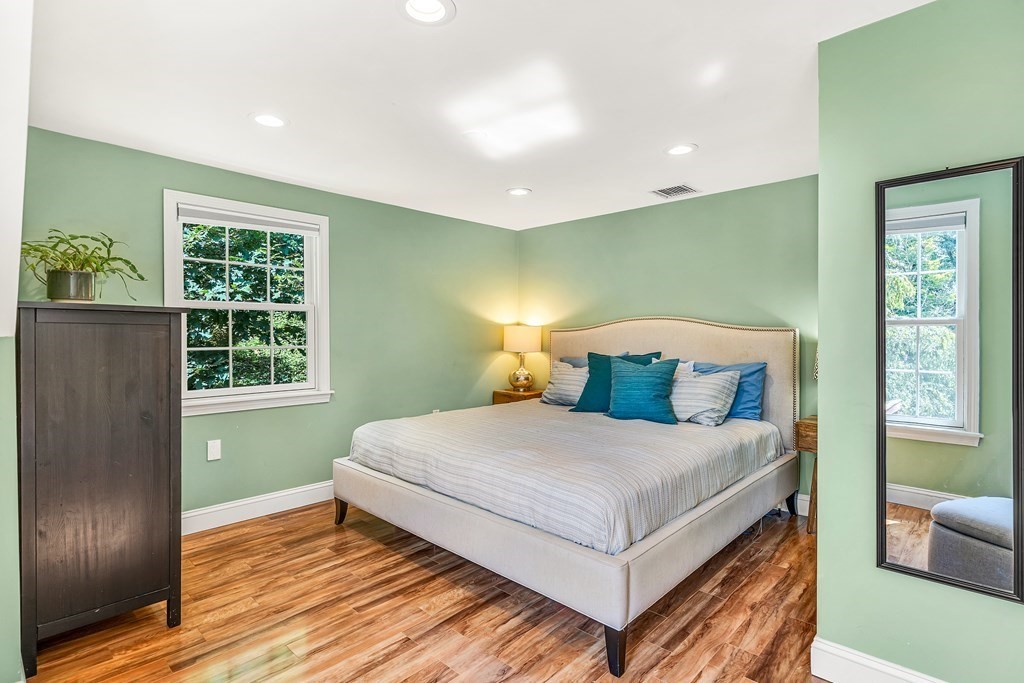 239 Sudbury Road Stow, MA 01775 - Photo 22 of 31 a bedroom with a bed and window