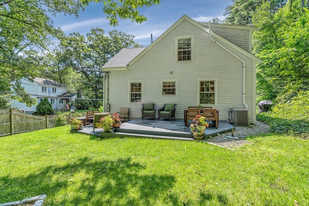 239 Sudbury Road Stow, MA 01775 - Photo 25 of 31 a view of a house with backyard and a patio