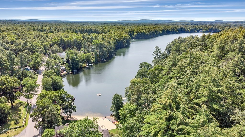 239 Sudbury Road Stow, MA 01775 - Photo 27 of 31 a view of a lake with a city view