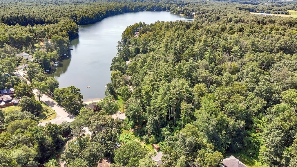 239 Sudbury Road Stow, MA 01775 - Photo 28 of 31 a view of a lake with a building