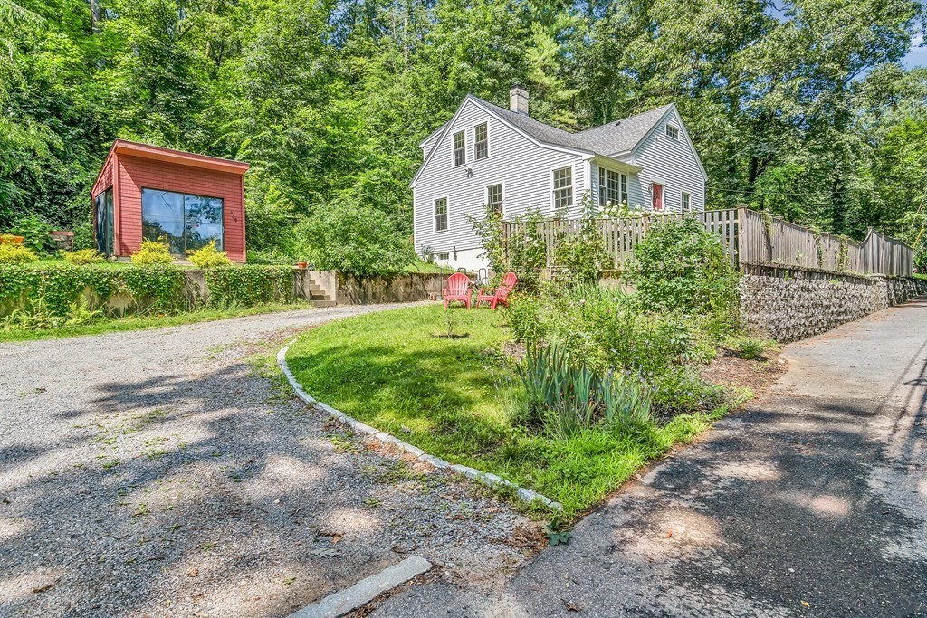 239 Sudbury Road Stow, MA 01775 - Photo 3 of 31 a view of a house with yard and plants
