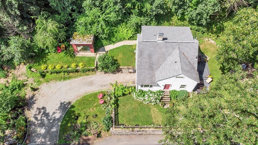 239 Sudbury Road Stow, MA 01775 - Photo 4 of 31 an aerial view of a house with a yard and garden