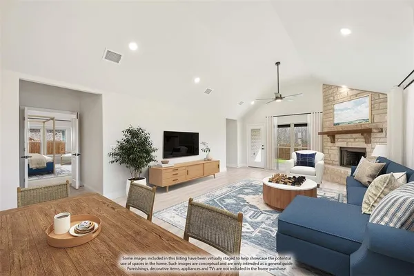 a living room with furniture fireplace and a flat screen tv