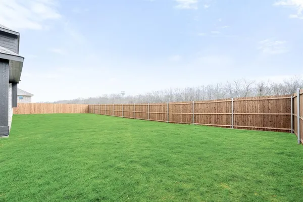 a view of an outdoor space and a yard