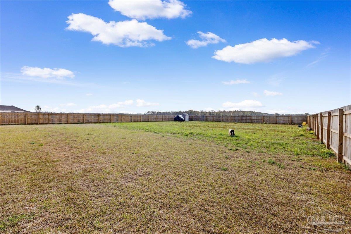 9303 Salter Road Pace, FL 32571 - Photo 20 of 23 a view of a lake