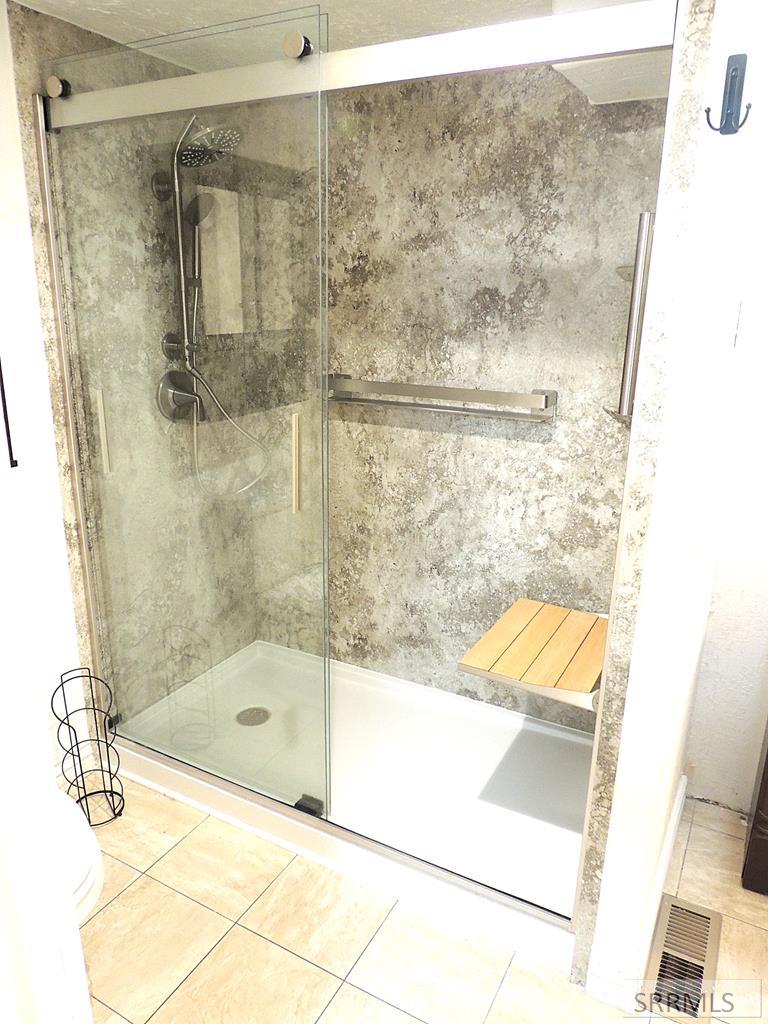 329 North Bridge Street St. Anthony, ID 83445 - Photo 10 of 16 Step in shower with seat