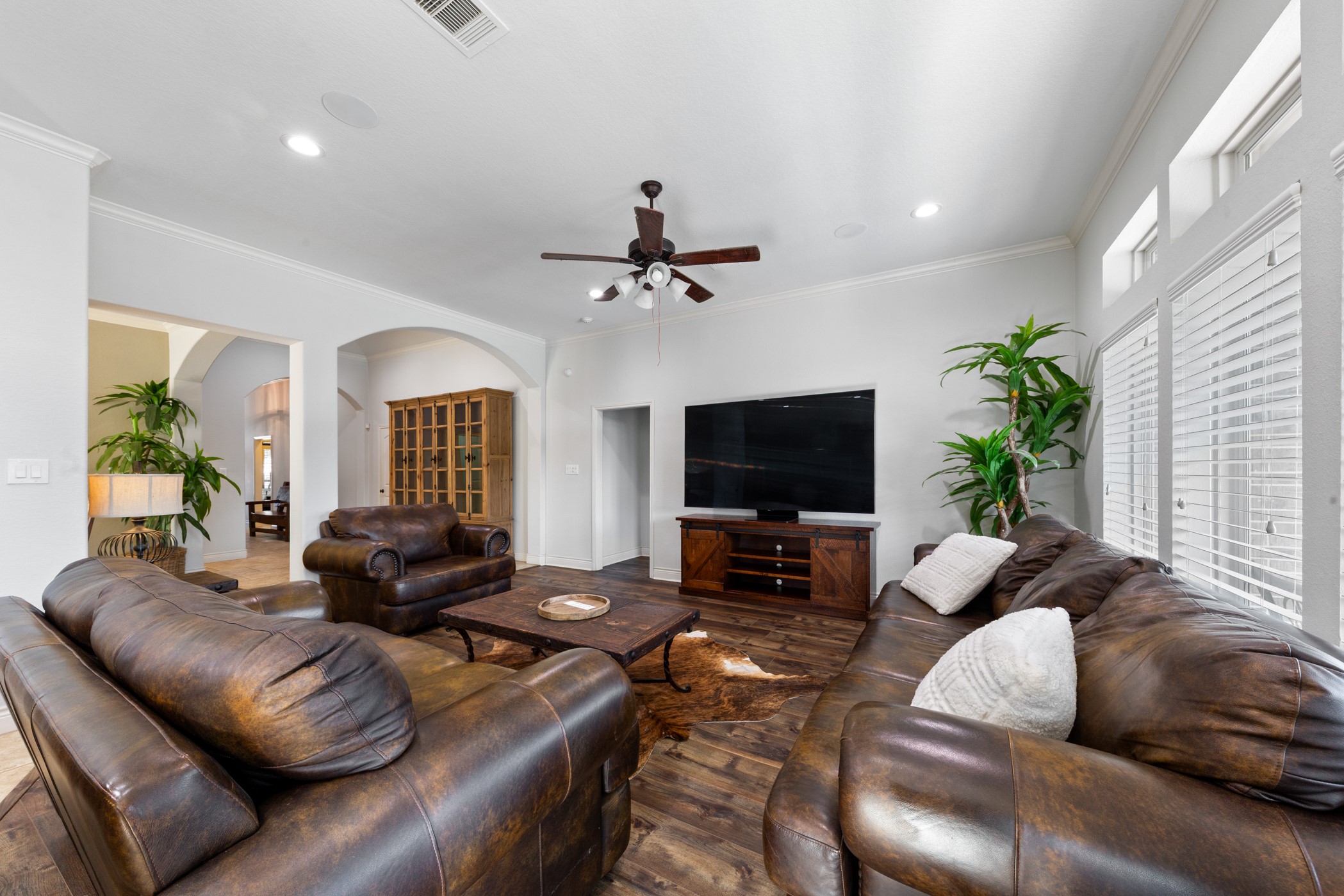 1235 Oxbow Crossing Lane Rosenberg, TX 77471 - Photo 14 of 34 a living room with furniture and a flat screen tv