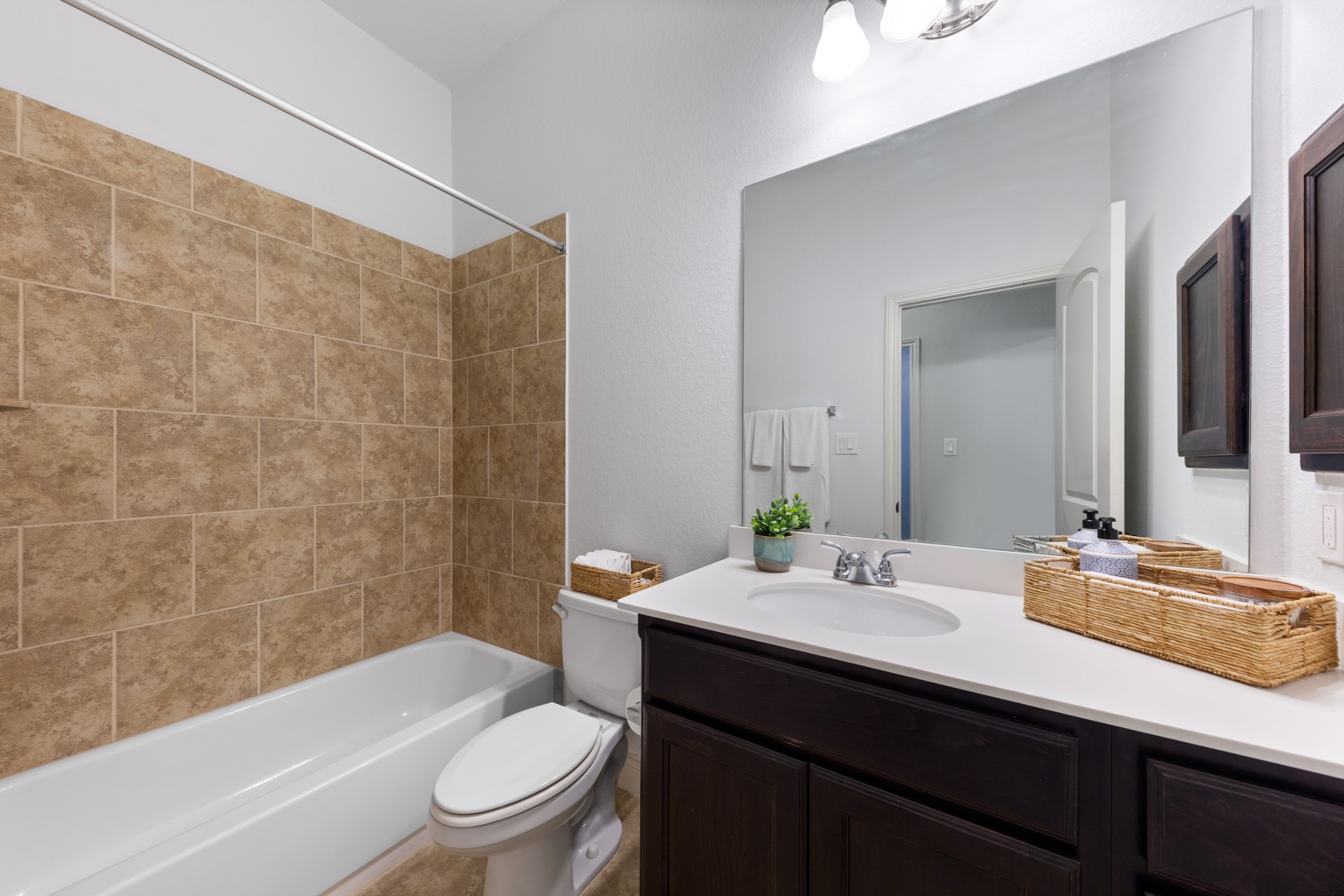 1235 Oxbow Crossing Lane Rosenberg, TX 77471 - Photo 17 of 34 a bathroom with a sink a toilet and shower