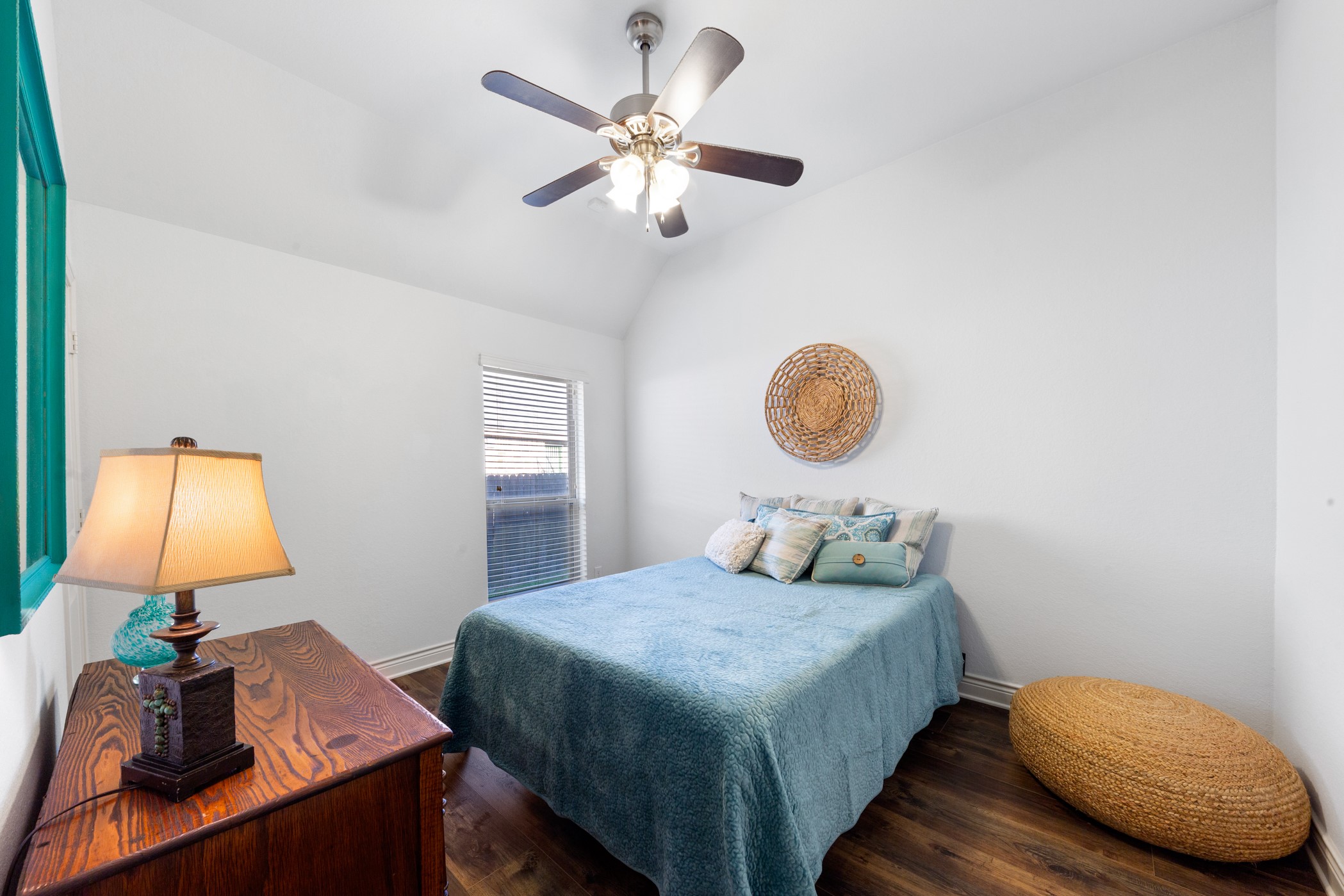 1235 Oxbow Crossing Lane Rosenberg, TX 77471 - Photo 18 of 34 a bedroom with a bed and a lamp on table with wooden floor