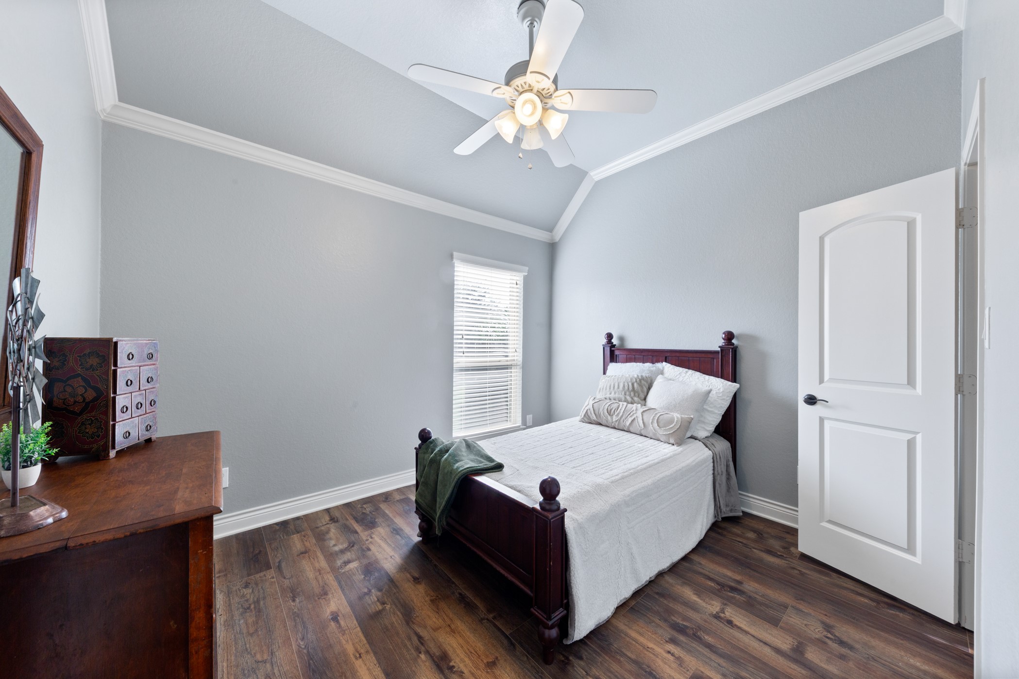 1235 Oxbow Crossing Lane Rosenberg, TX 77471 - Photo 19 of 34 a bedroom with a bed and a desk