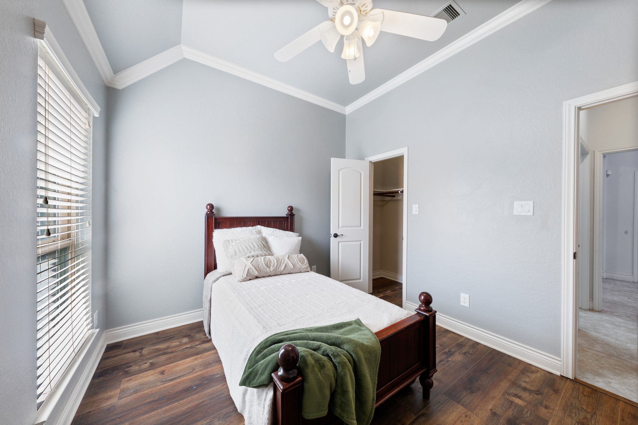 1235 Oxbow Crossing Lane Rosenberg, TX 77471 - Photo 20 of 34 a bedroom with a bed and wooden floor