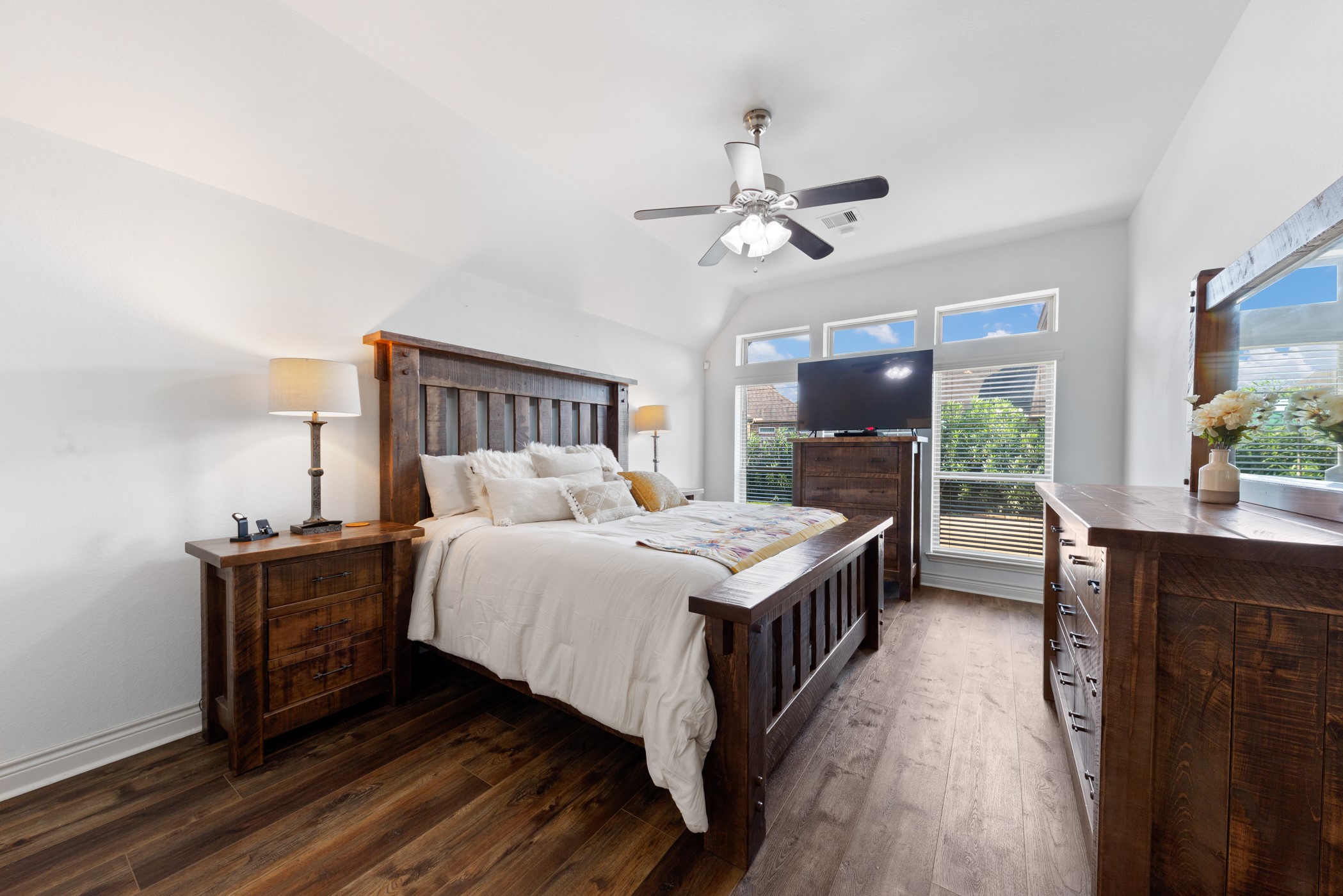 1235 Oxbow Crossing Lane Rosenberg, TX 77471 - Photo 22 of 34 a bedroom with a bed a mirror on table and chairs