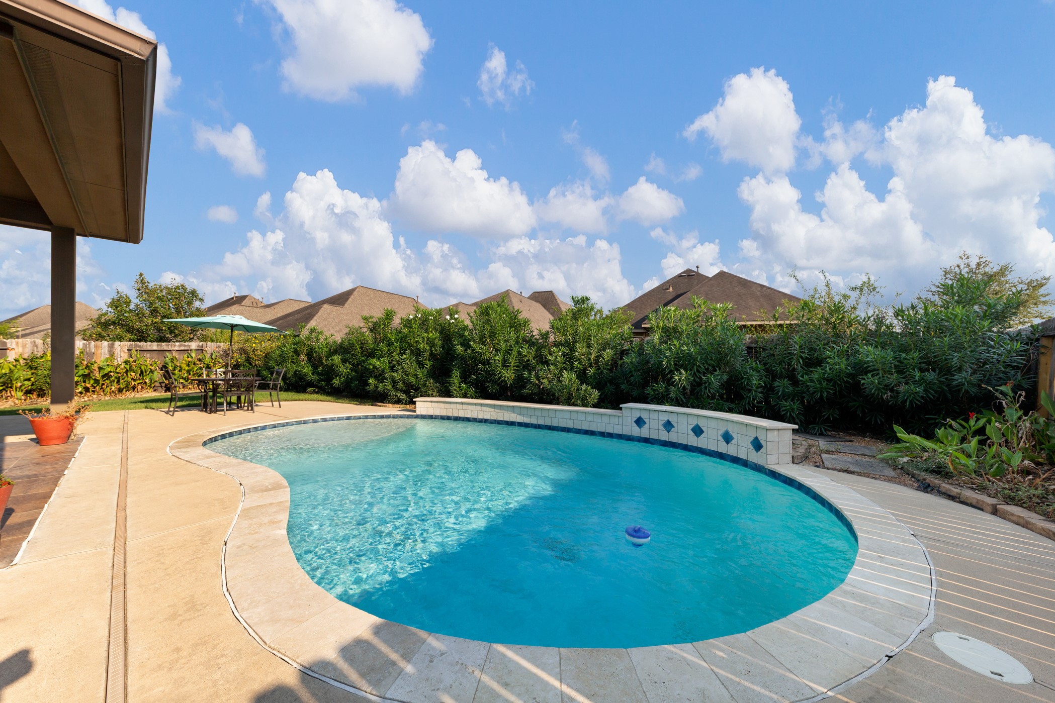 1235 Oxbow Crossing Lane Rosenberg, TX 77471 - Photo 28 of 34 a view of a swimming pool with a yard