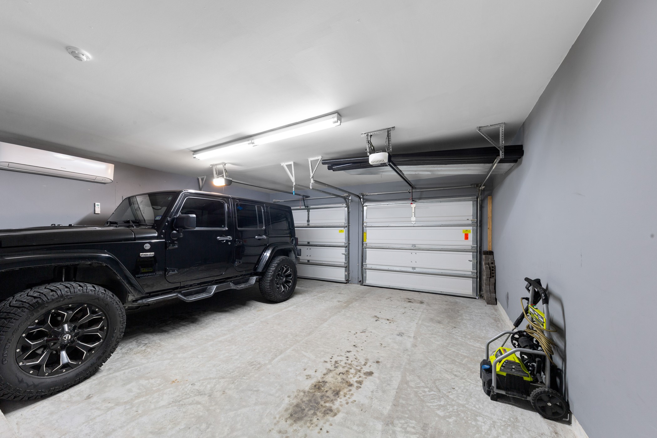 1235 Oxbow Crossing Lane Rosenberg, TX 77471 - Photo 30 of 34 a view of garage with parked cars
