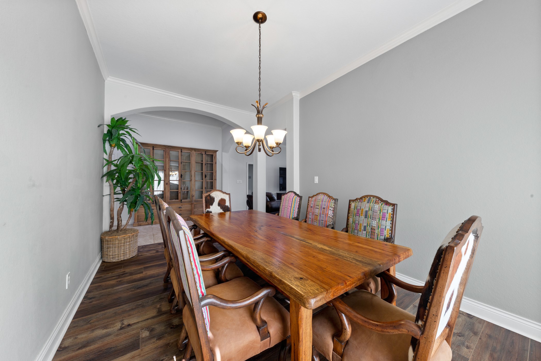 1235 Oxbow Crossing Lane Rosenberg, TX 77471 - Photo 4 of 34 a view of a dining room with furniture and wooden floor