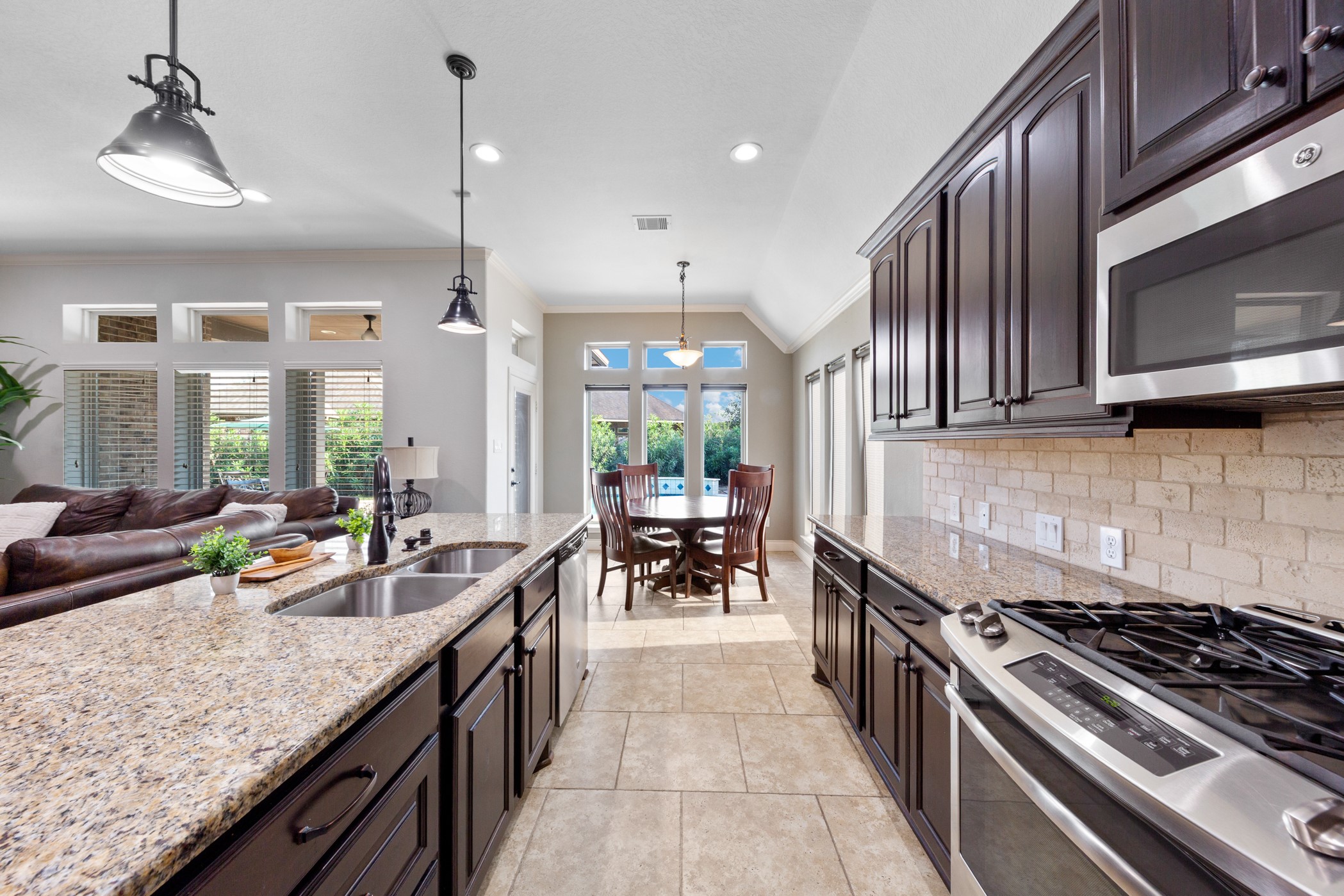 1235 Oxbow Crossing Lane Rosenberg, TX 77471 - Photo 8 of 34 a kitchen with granite countertop lots of counter top space