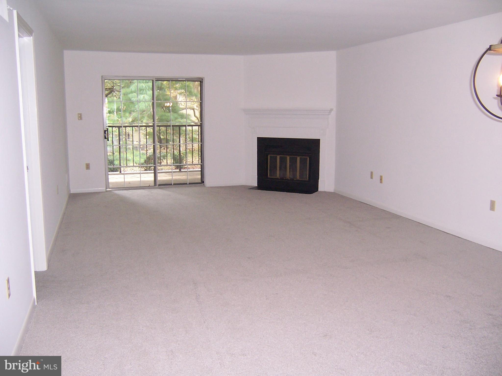 216 Valley Stream Lane Chesterbrook, PA 19087 - Photo 3 of 29 Spacious iving Room with Fireplace