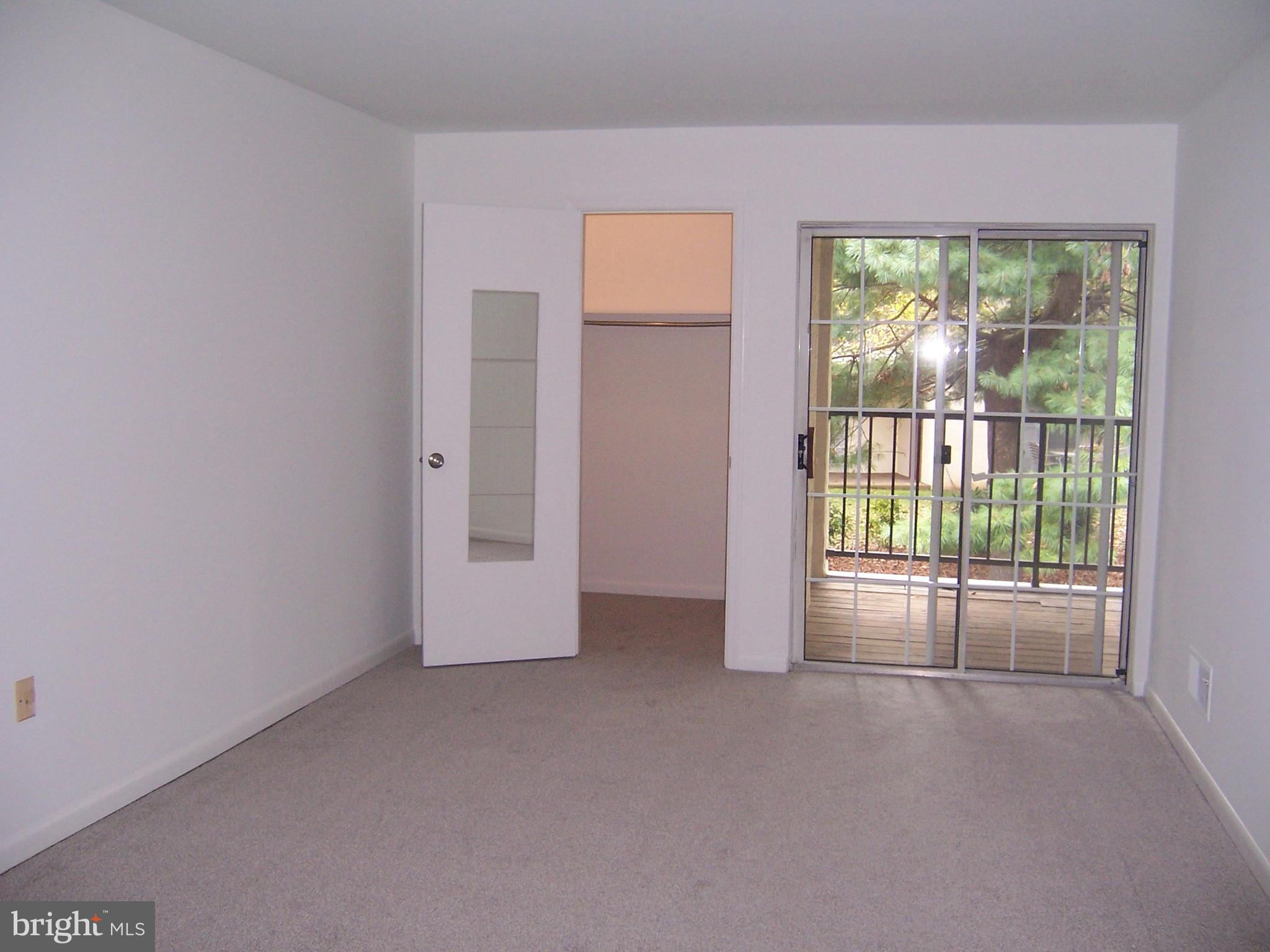 216 Valley Stream Lane Chesterbrook, PA 19087 - Photo 4 of 29 Bedroom w/Walk In Closet & Sliders to Deck