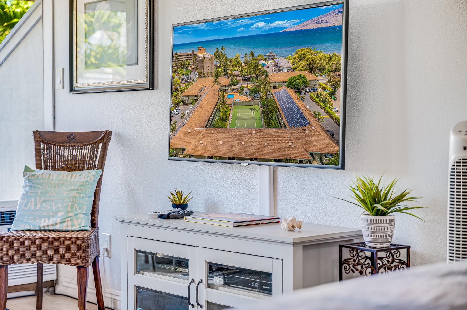715 South Kihei Road, Unit A207 Kihei, HI 96753 - Photo 14 of 27 a living room with furniture and a potted plant