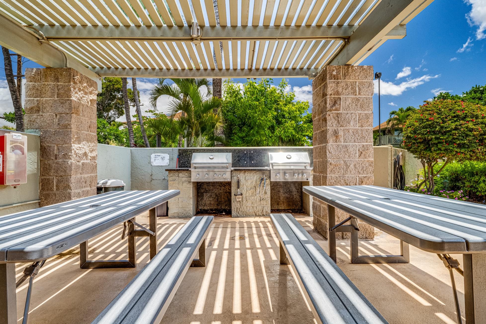 715 South Kihei Road, Unit A207 Kihei, HI 96753 - Photo 22 of 27 a view of balcony with wooden floor and outdoor seating