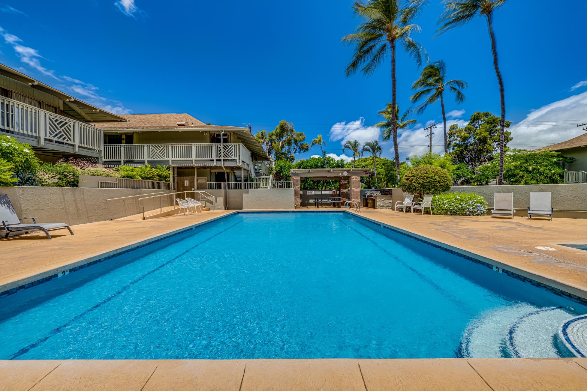 715 South Kihei Road, Unit A207 Kihei, HI 96753 - Photo 23 of 27 a view of swimming pool with outdoor seating and a patio