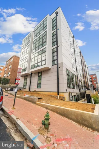 a view of a building with a street