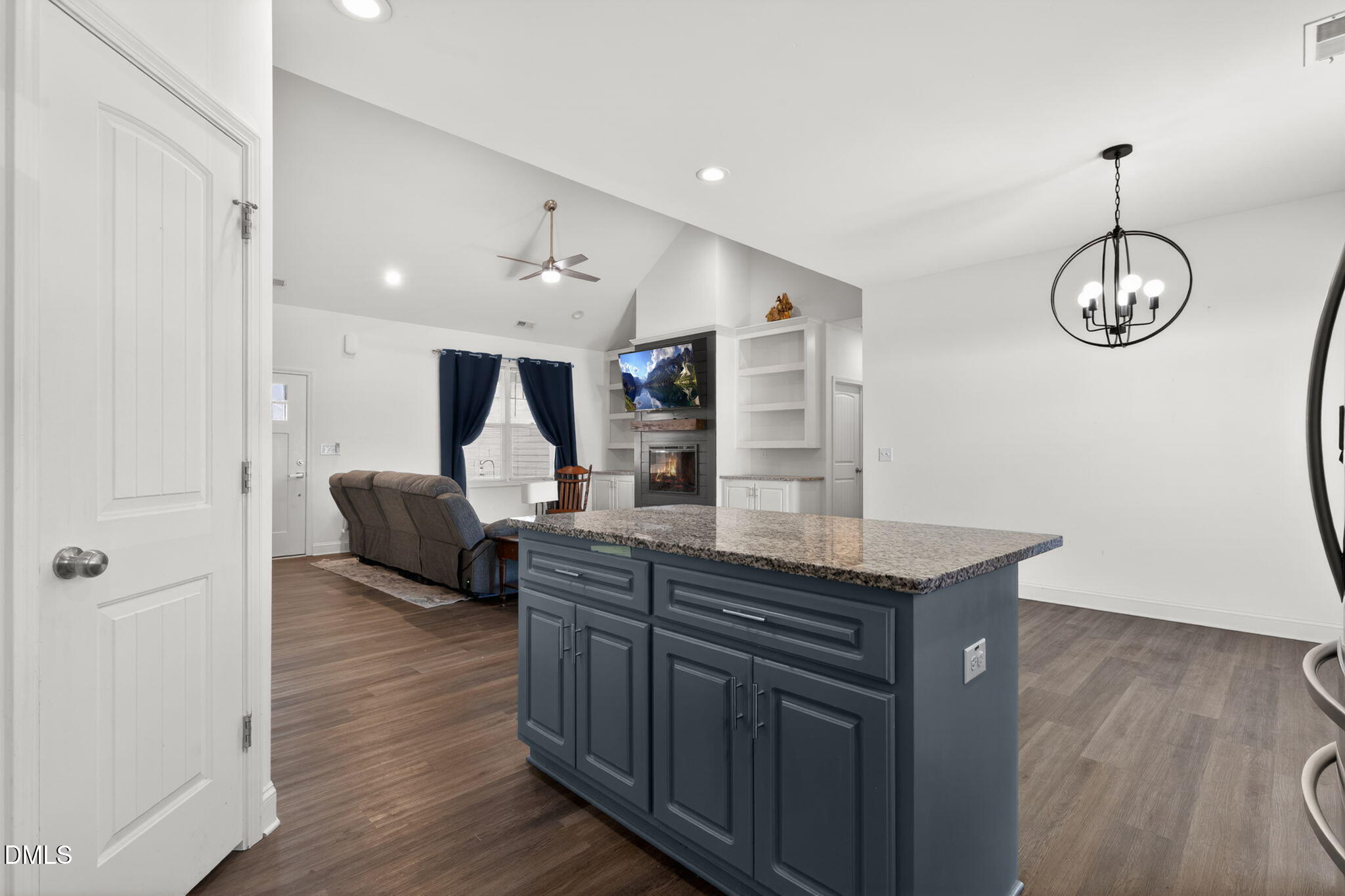 9084 Byron Court Bailey, NC 27807 - Photo 11 of 40 a view of living room with granite countertop furniture and wooden floor