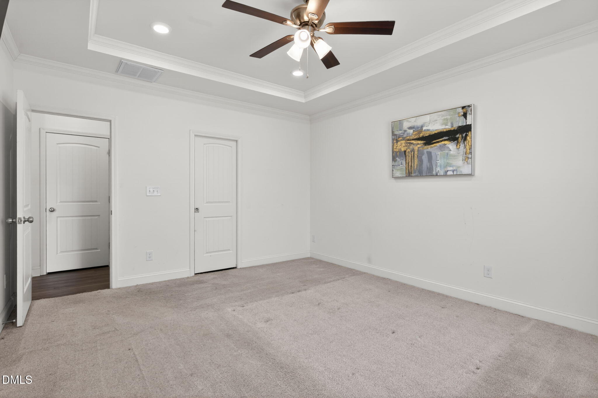 9084 Byron Court Bailey, NC 27807 - Photo 16 of 40 an empty room with closet and fan