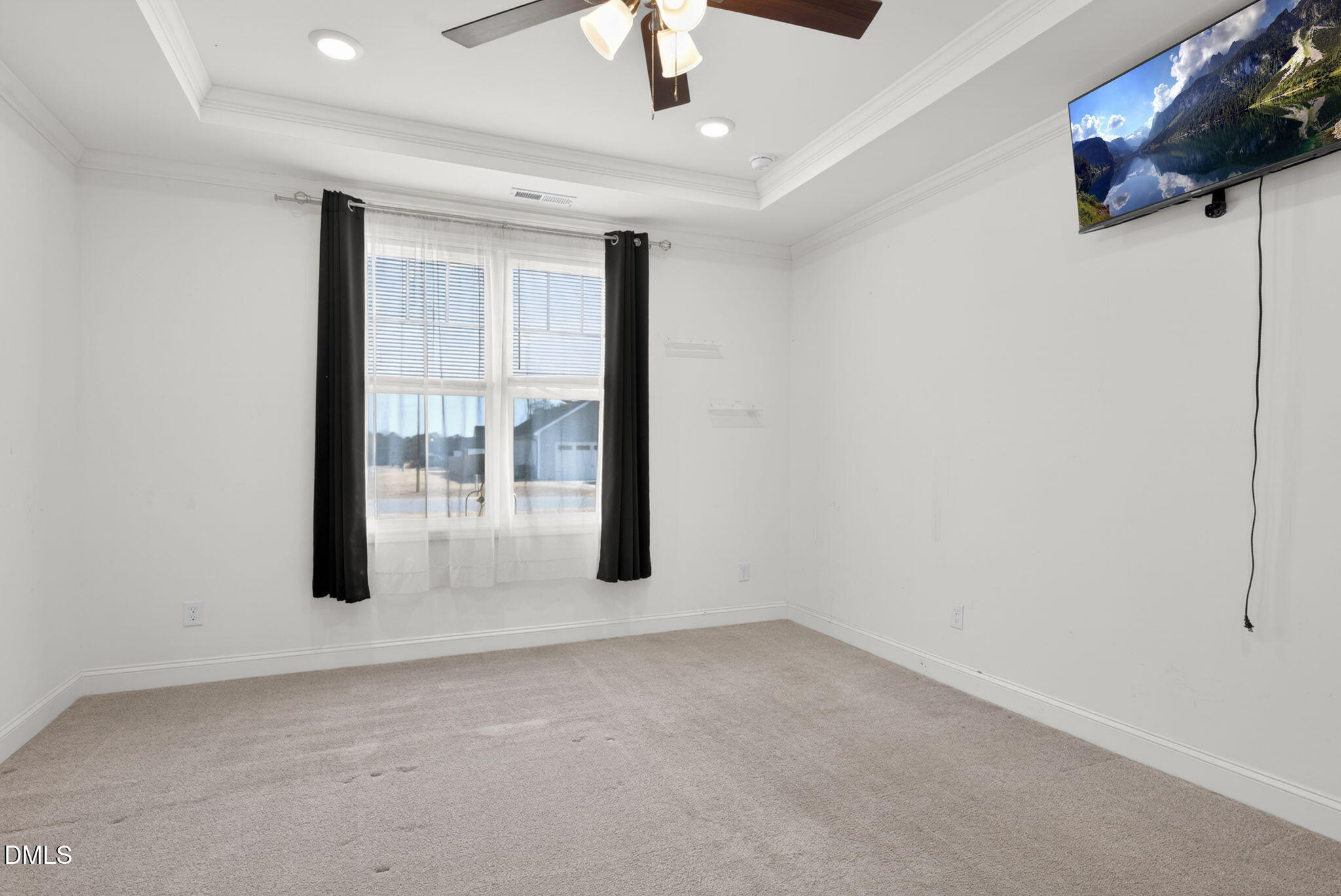 9084 Byron Court Bailey, NC 27807 - Photo 17 of 40 a view of a room with sliding door and chandelier fan