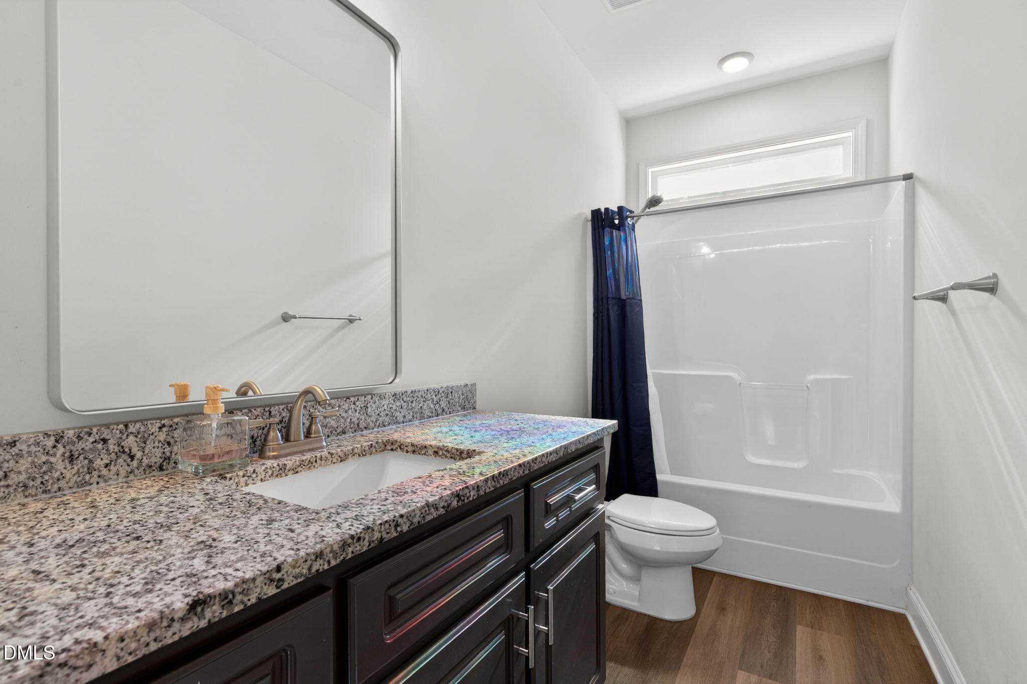 9084 Byron Court Bailey, NC 27807 - Photo 25 of 40 a bathroom with a granite countertop sink toilet and shower