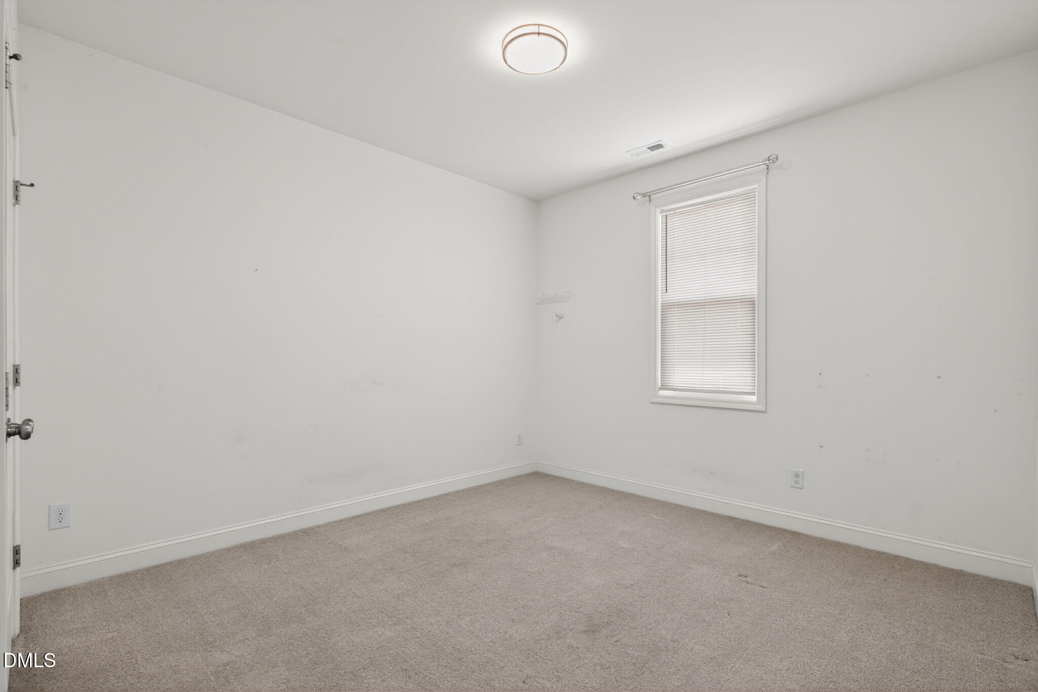 9084 Byron Court Bailey, NC 27807 - Photo 26 of 40 an empty room with a window