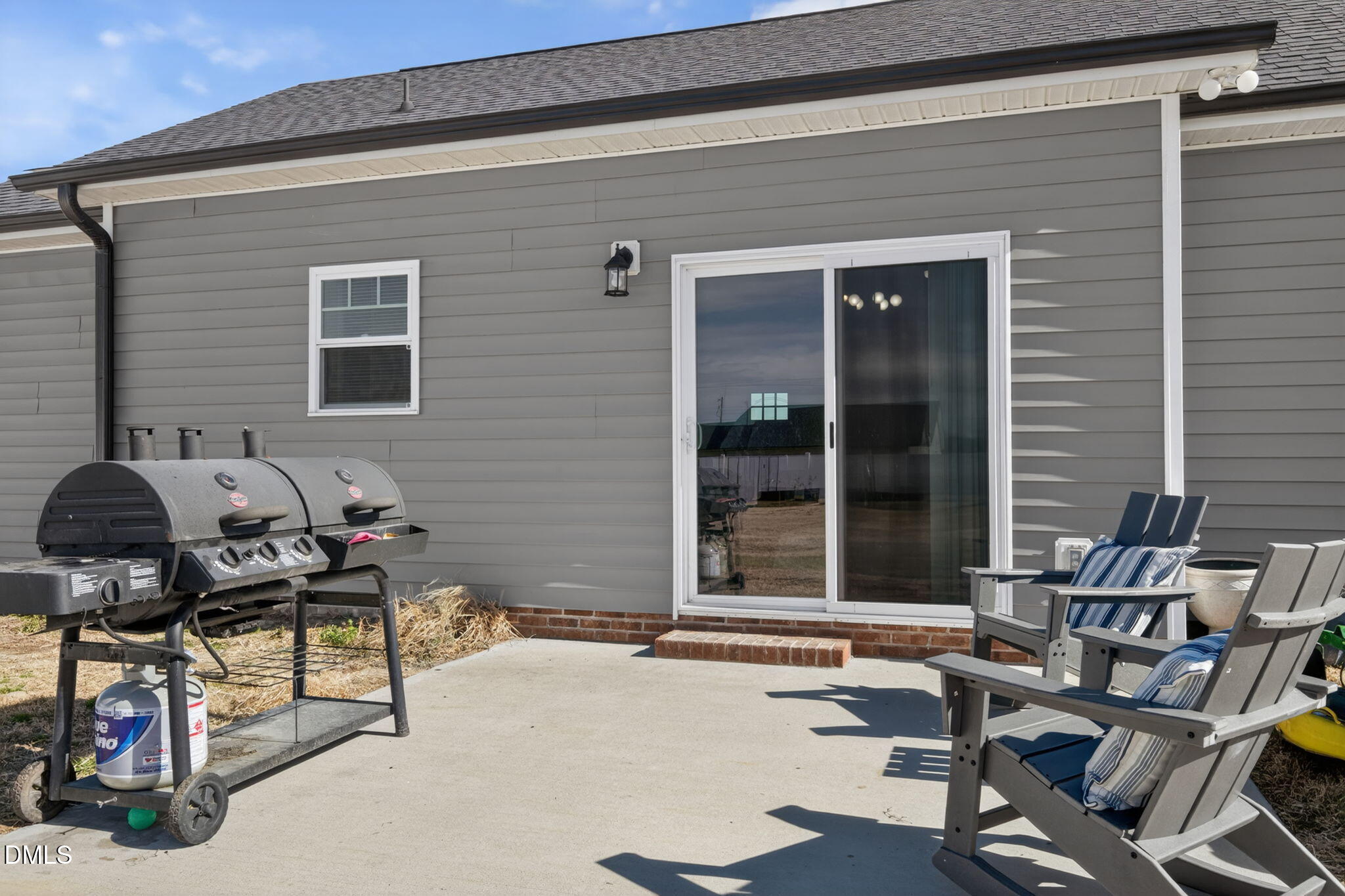 9084 Byron Court Bailey, NC 27807 - Photo 31 of 40 a backyard of a house with seating space