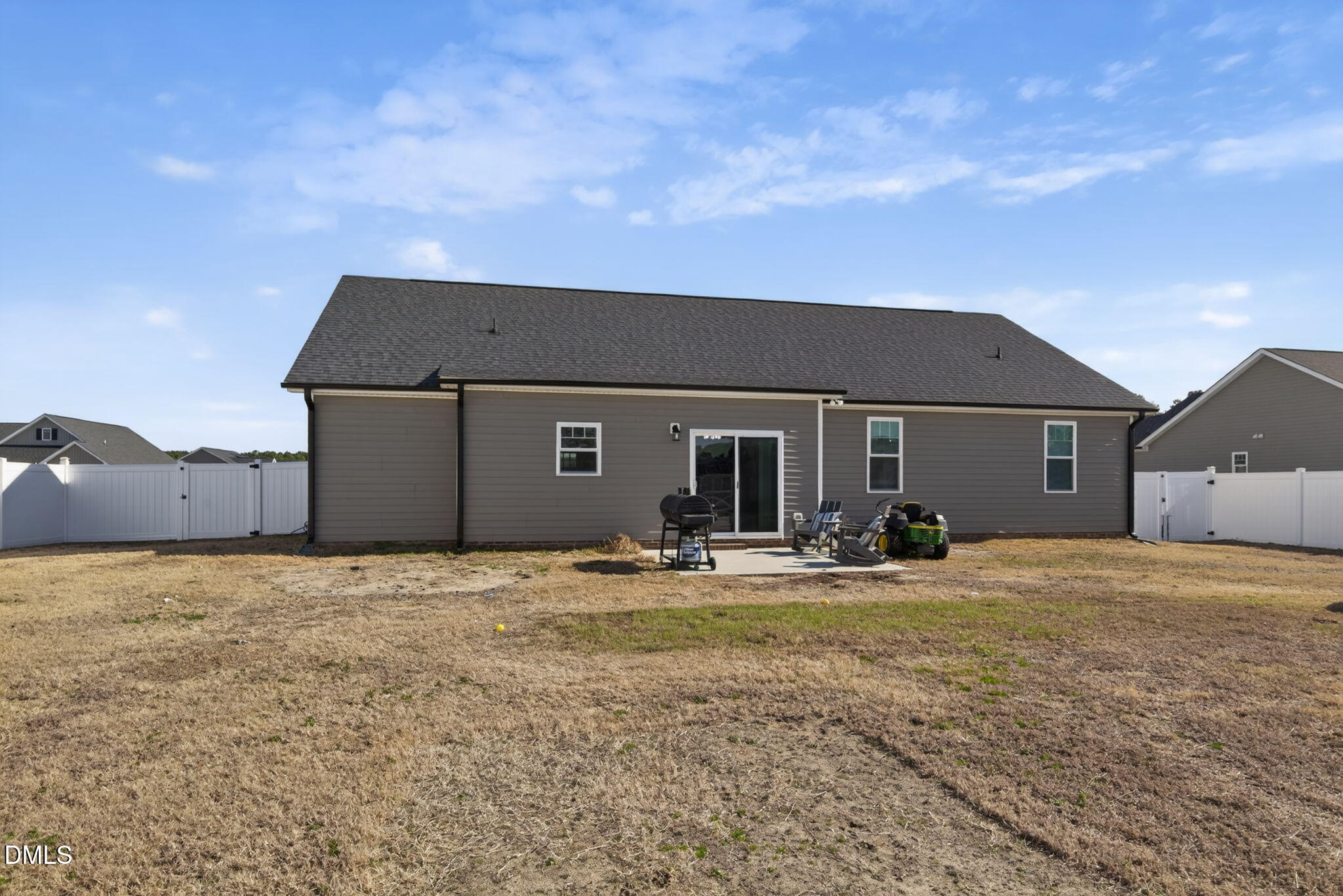 9084 Byron Court Bailey, NC 27807 - Photo 34 of 40 a house view with a sitting space and garden