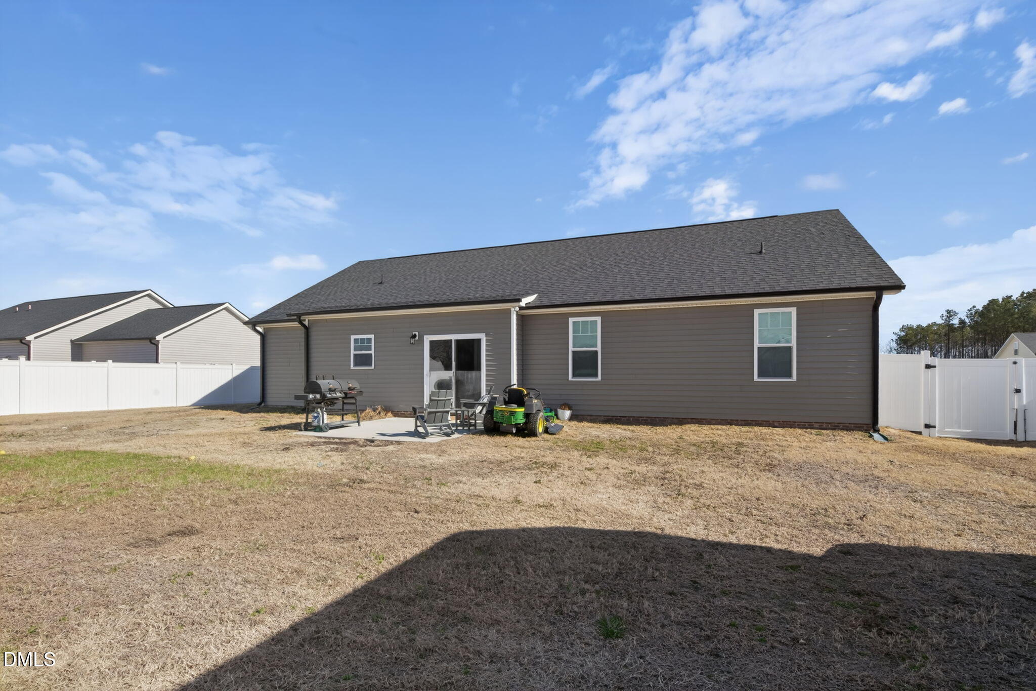 9084 Byron Court Bailey, NC 27807 - Photo 36 of 40 a front view of a house with patio