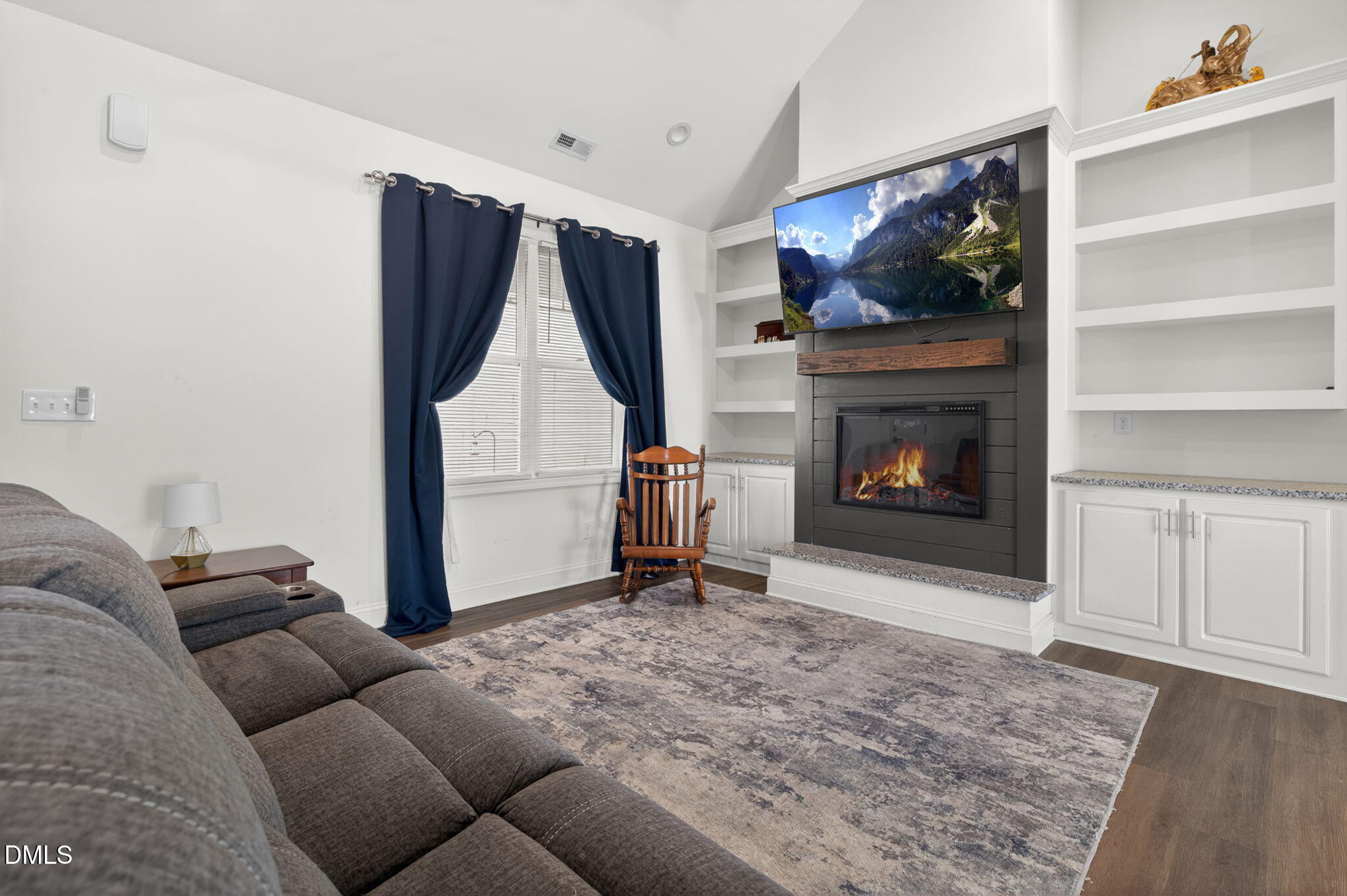9084 Byron Court Bailey, NC 27807 - Photo 4 of 40 a living room with furniture and a fireplace