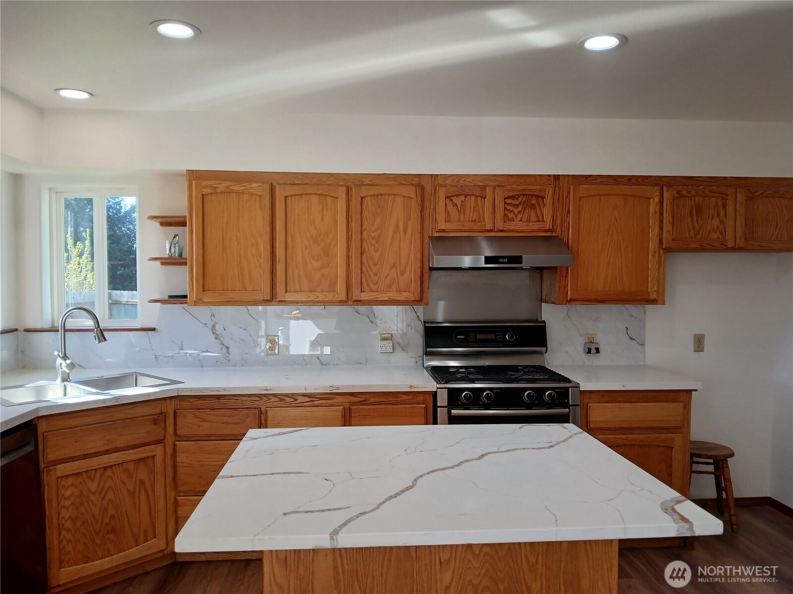 10 Spruce South Bend, WA 98586 - Photo 15 of 29 a kitchen with sink a stove and cabinets