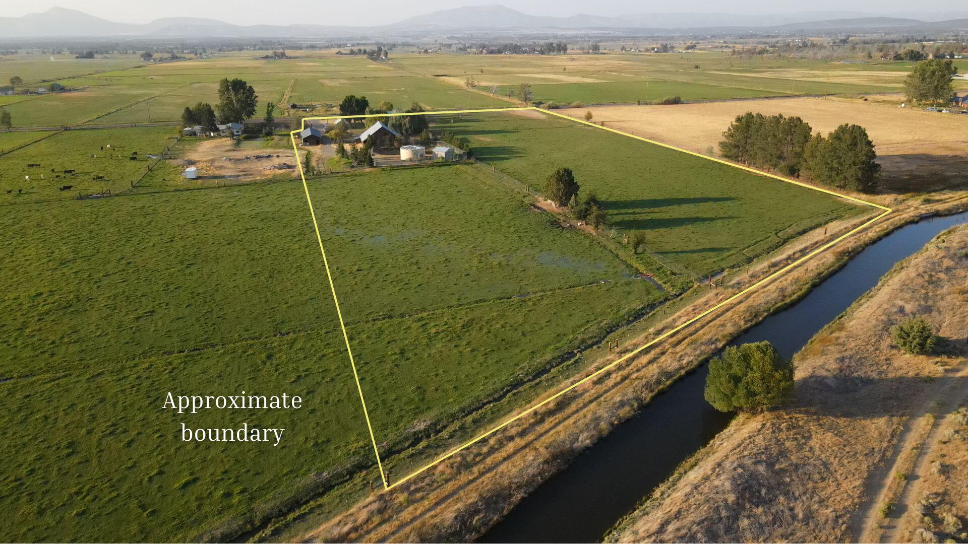 14212 Southwest Riggs Road Powell Butte, OR 97753 - Photo 35 of 48 drone w/ borders