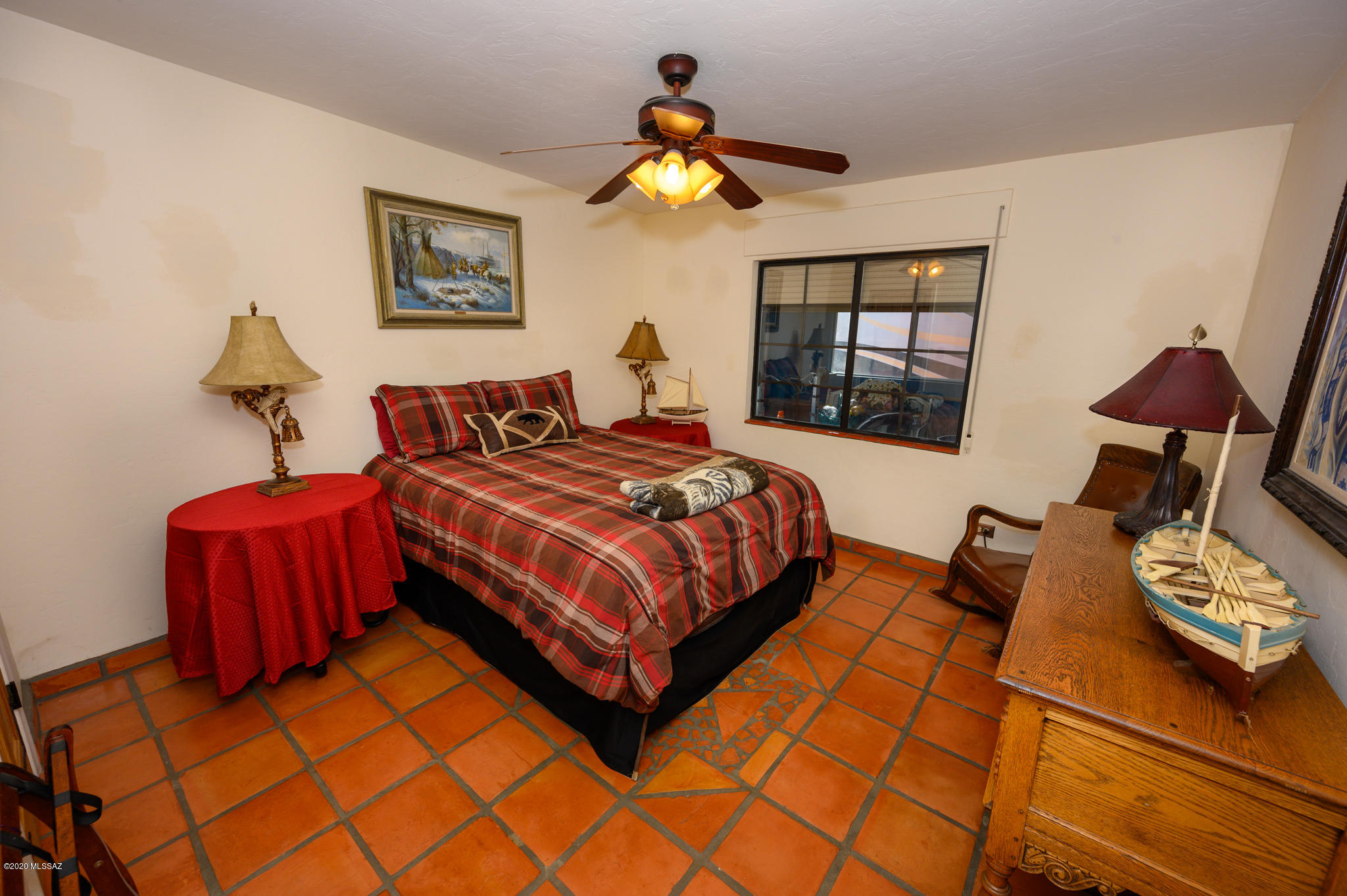 893 Gecko Lane Rio Rico, AZ 85648 - Photo 38 of 40 a bedroom with a bed and window