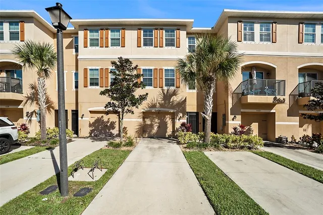 a front view of a building with many windows
