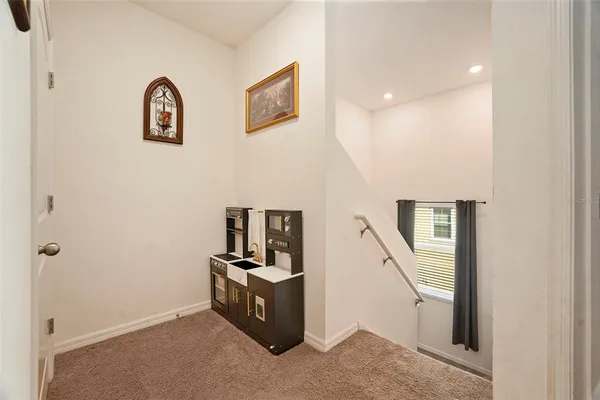 a view of a hallway with workspace