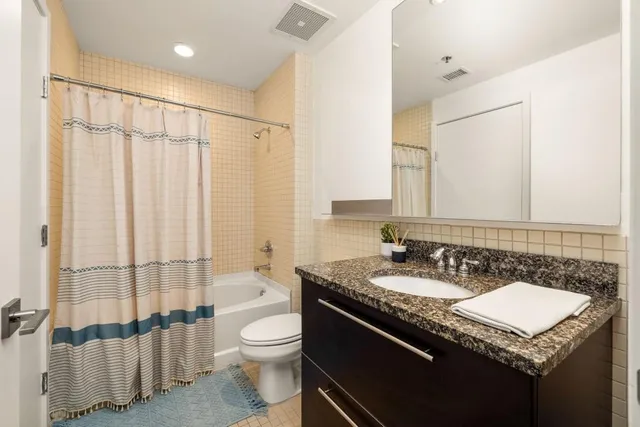 a view of a bathtub in a room