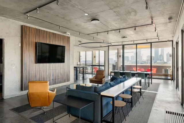 a outdoor dining space with furniture and a potted plant