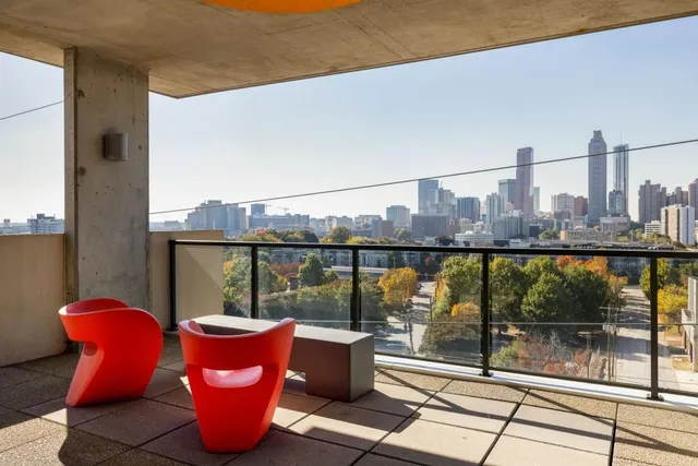 a view of a city with tall buildings in the background