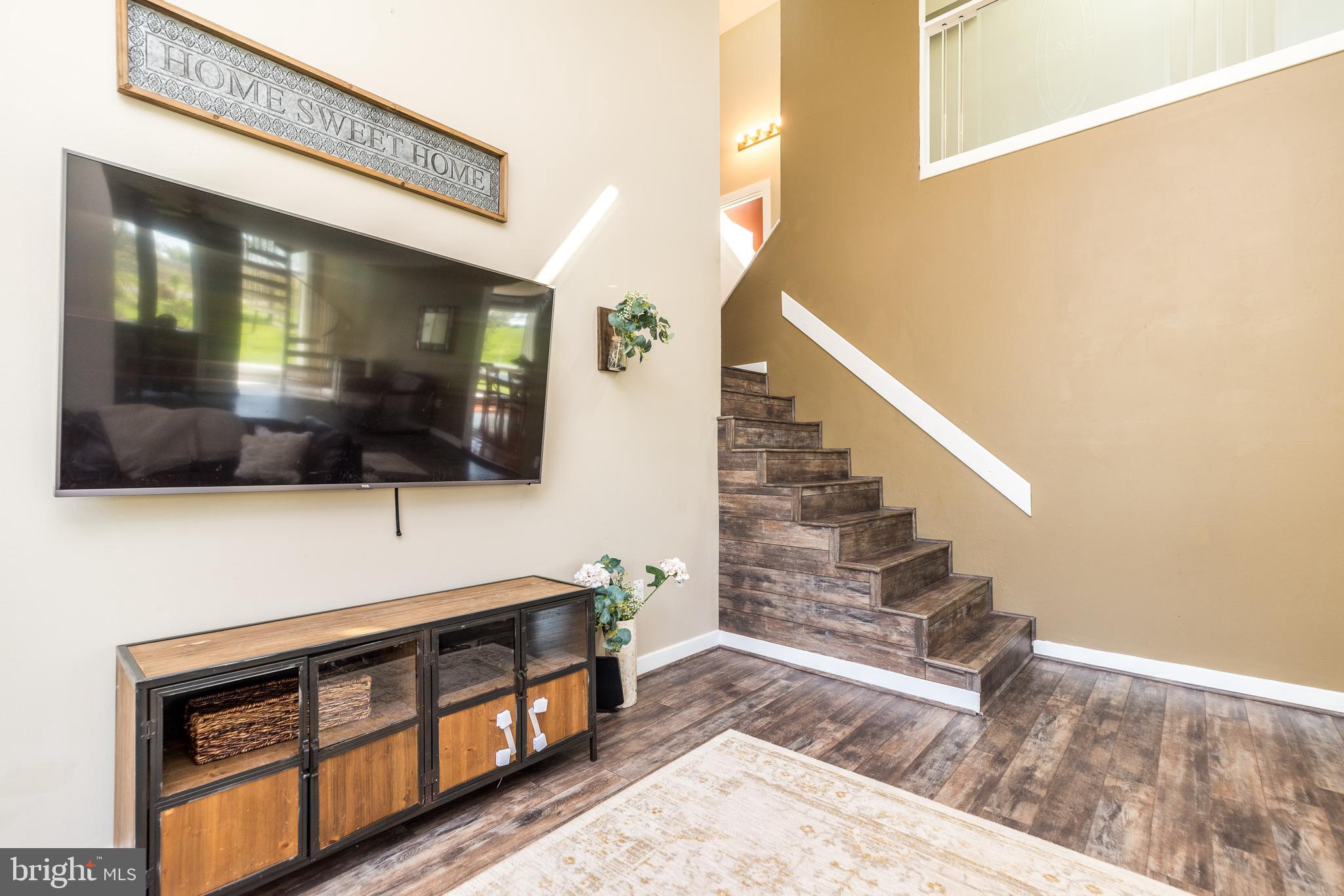 440 Sturgis Road Harleysville, PA 19438 - Photo 20 of 51 Family room with stair case and overlook
