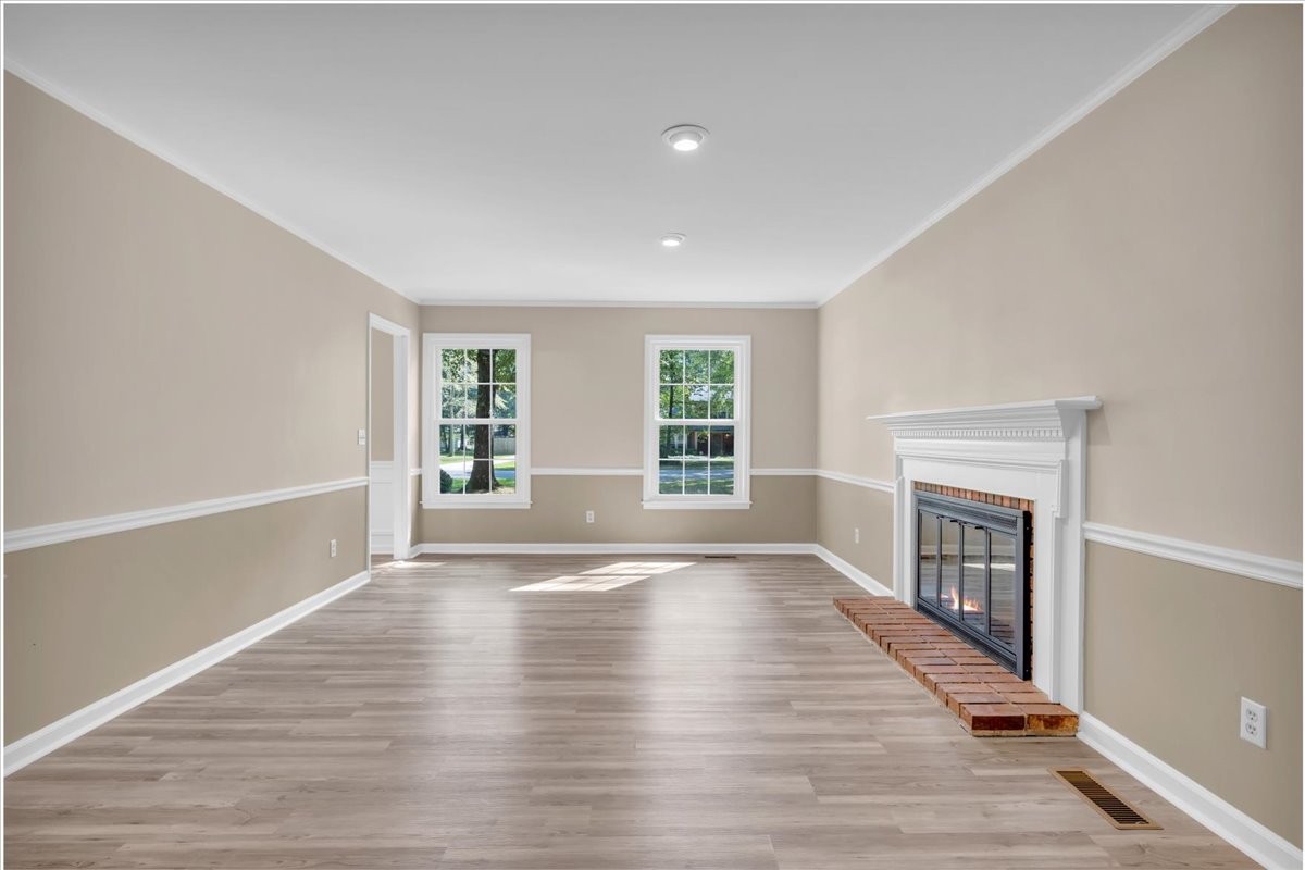 302 Marbeth Lane Tullahoma, TN 37388 - Photo 17 of 50 wooden floor in an empty room with a window