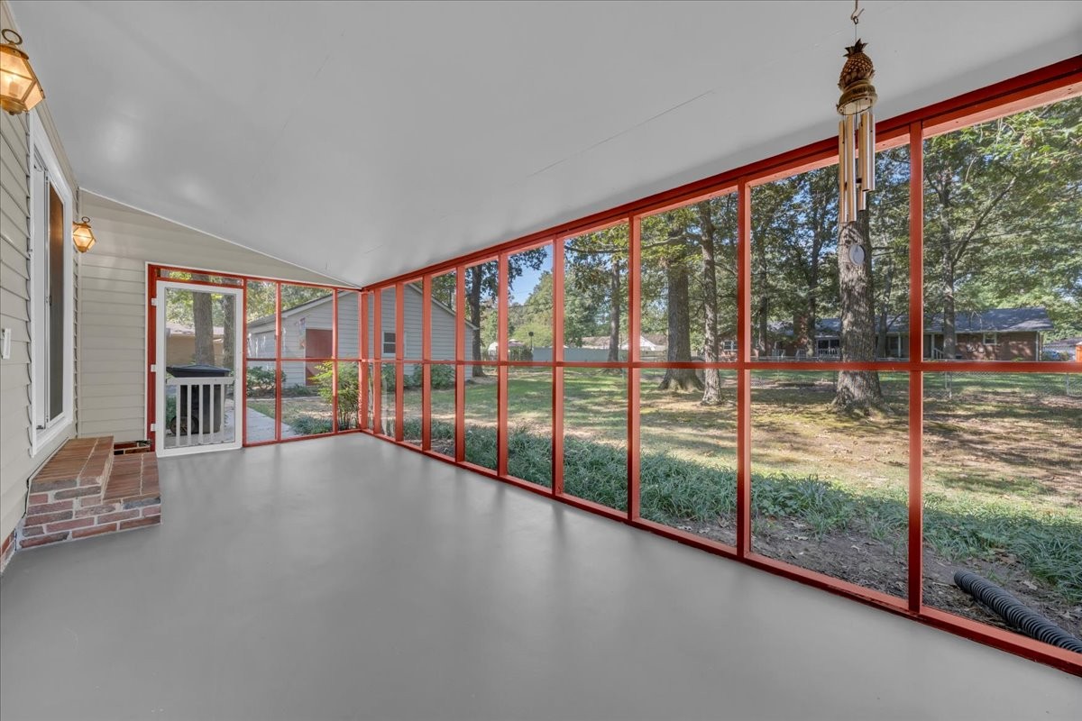 302 Marbeth Lane Tullahoma, TN 37388 - Photo 34 of 50 a view of an empty room with wooden floor and windows
