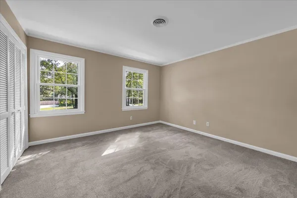 an empty room with windows