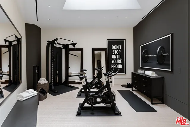 a utility room with sink dryer and washer